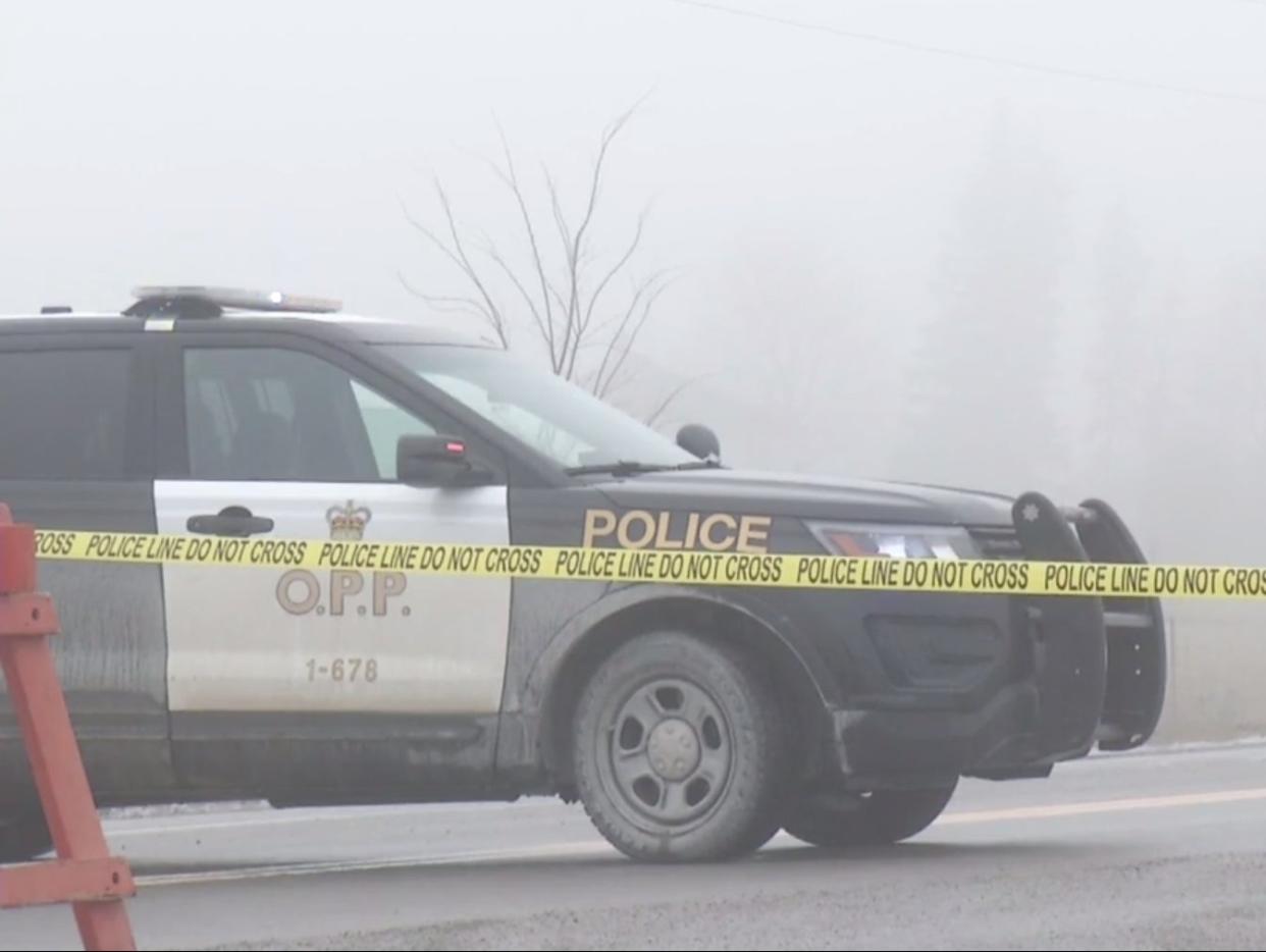 An Ontario police car on Pigeon Lake Road, where a one-year-old was shot in an alleged kidnap attempt  (Global News Canada)
