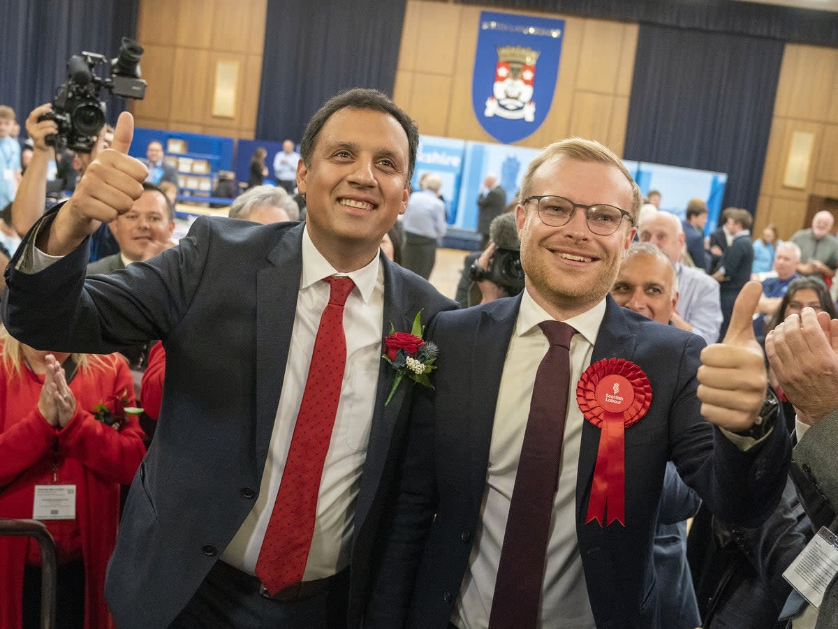 Scottish Labour leader Anas Sarwar with winning candidate Michael Shanks (PA)