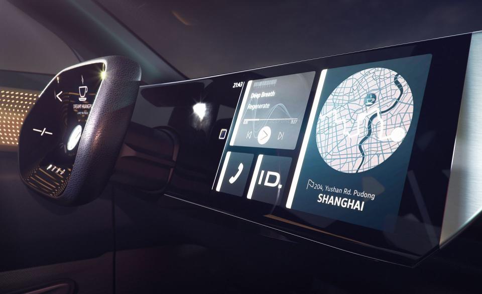 <p>With a dashboard and a center instrument panel that appears completely devoid of buttons, the I.D. Roomzz concept borrows heavily from the design shown in <a href="https://www.caranddriver.com/news/a15338939/crozz-fit-volkswagen-announces-production-ev-crossover-for-2020/" rel="nofollow noopener" target="_blank" data-ylk="slk:the I.D. Crozz concept;elm:context_link;itc:0;sec:content-canvas" class="link ">the I.D. Crozz concept</a> and follows a trend toward minimalism elsewhere in the automotive industry.</p>