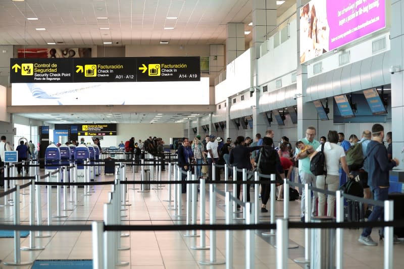 A general view shows passengers at the counters of Copa Airlines at Tocumen International Airport after the Panamanian government restricted flights in recent days due to the coronavirus disease (COVID-19) outbreak, in Panama City