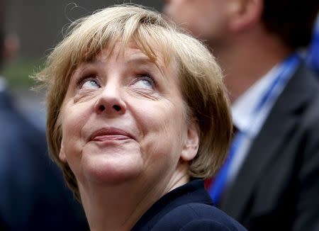 Germany's Chancellor Angela Merkel looks up as she arrives at an emergency euro zone summit in Brussels, Belgium, July 7, 2015. REUTERS/Francois Lenoir