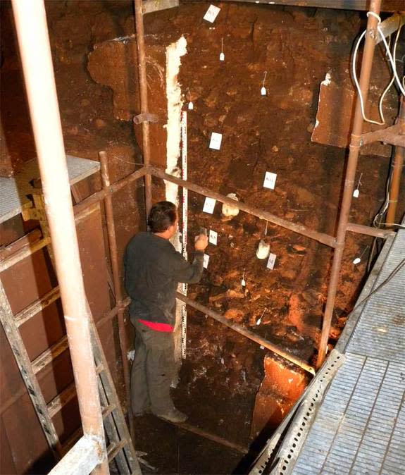 Researcher Takis Karkanas analyzing deposits in Alepotrypa Cave.