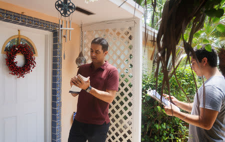 Democratic candidate Matt Haggman knocks on doors seeking votes in a Miami-area Congressional district in Florida, U.S. July 8, 2018. REUTERS/Letitia Stein