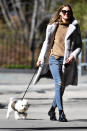 <p>Olivia Palermo takes her pup for a stroll in Brooklyn on Saturday.</p>