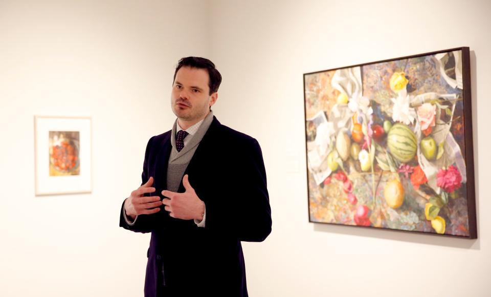 Jeremiah Matthew Davis talks on Feb. 8 about paintings during a preview of "The Art of Food" at Oklahoma Contemporary Arts Center in Oklahoma City.