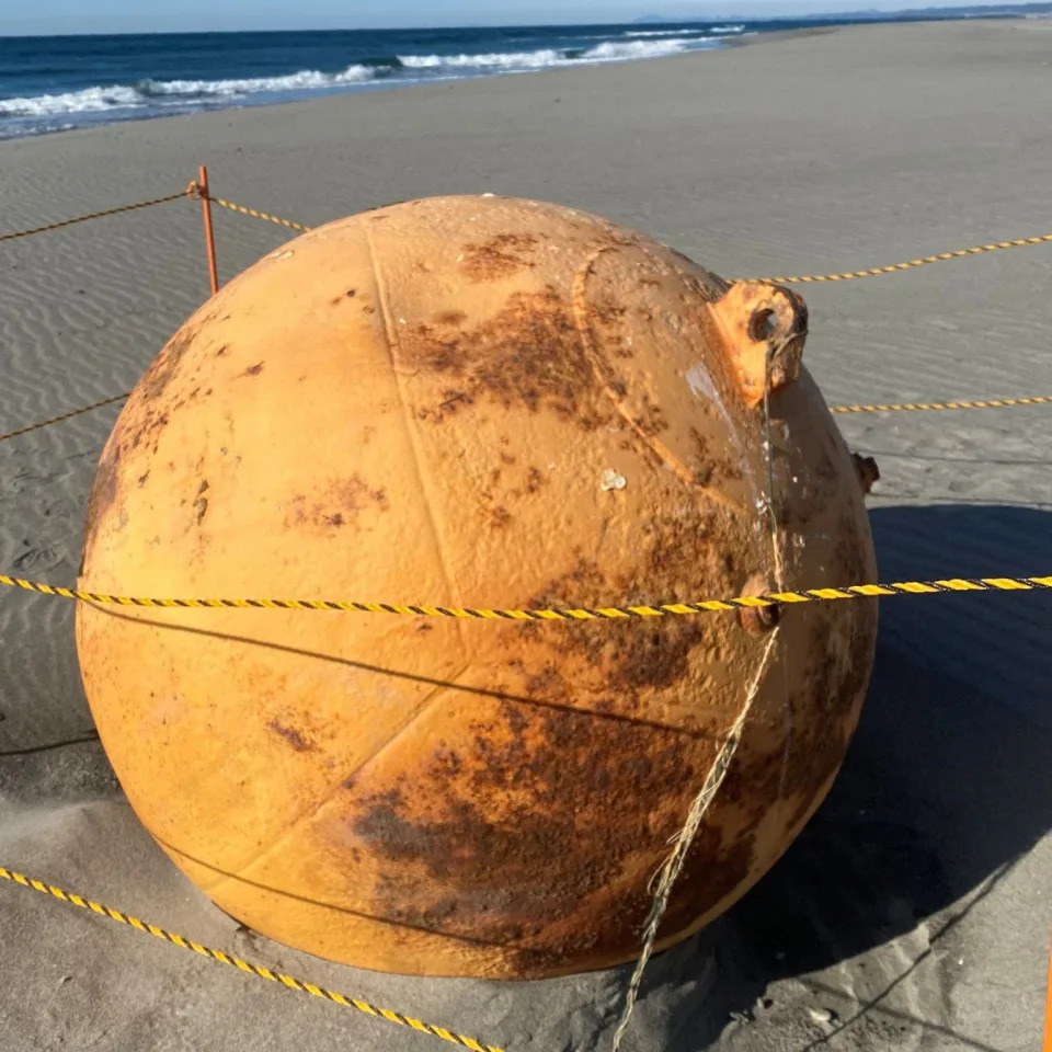 A ball is seen on a beach in Hamamatsu, Japan earlier this month - REUTERS