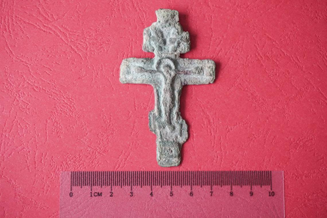 The cross, made from copper alloy, dates to either the 18th or 19th centuries, officials said.