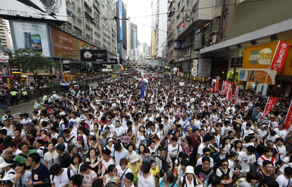 An annual protest march in downtown Hong Kong on July 1, 2014 in demand for democracy.<span class="copyright">Kin Cheung/AP</span>