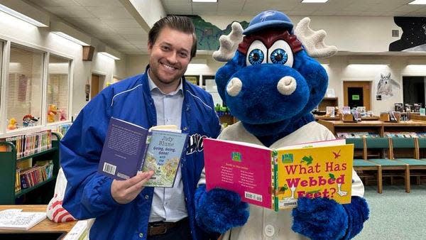 Blue Wahoos broadcaster Erik Bremer joined with team mascot Kazoo during Literacy Night at Pensacola's Montclair Elementary School earlier in December.