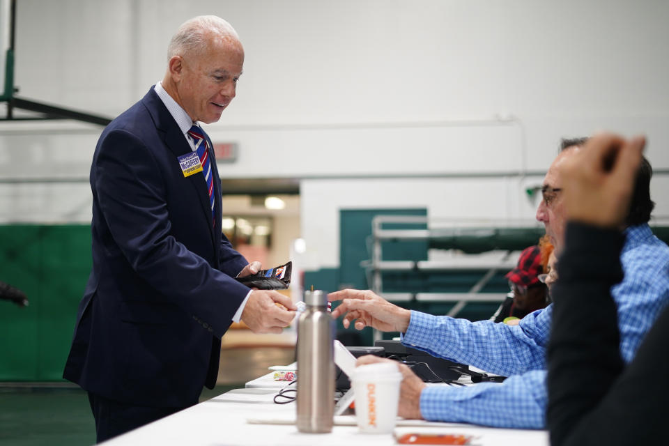 Daniel McCaffery, Democratic candidate for Pennsylvania Supreme Court judge, checks in at his polling place before voting in Philadelphia, Tuesday, Nov. 7, 2023. (AP Photo/Matt Rourke)