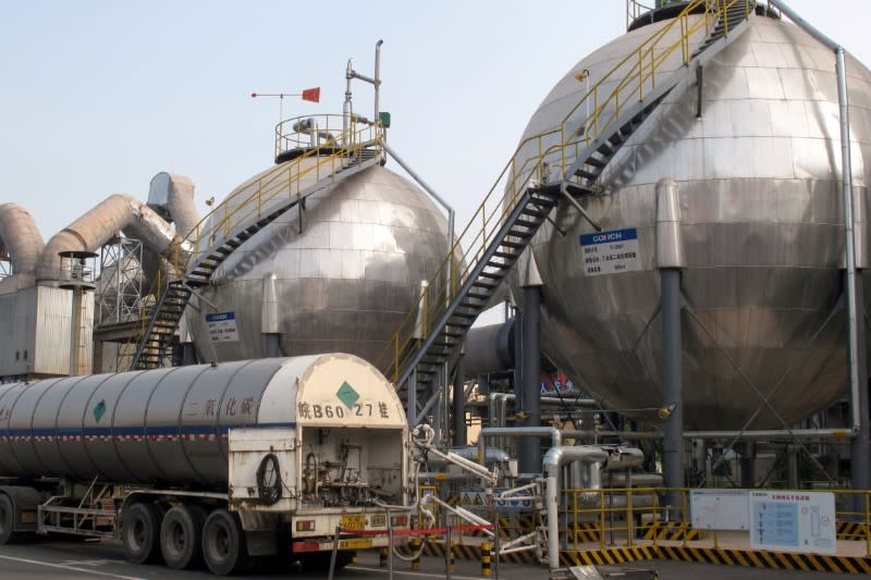 FILE PHOTO: Carbon dioxide storage tanks are seen at a cement plant and carbon capture facility in Wuhu