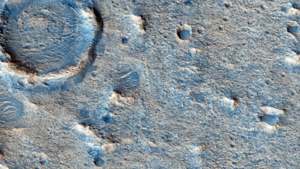 Topographic map of a part of Mars containing several large craters and many smaller craters