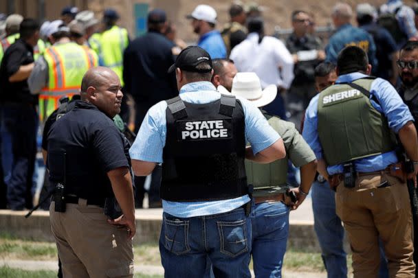 PHOTO: Law enforcement personnel guard the scene near Robb Elementary School in Uvalde, Texas, May 24, 2022. (Marco Bello/Reuters)