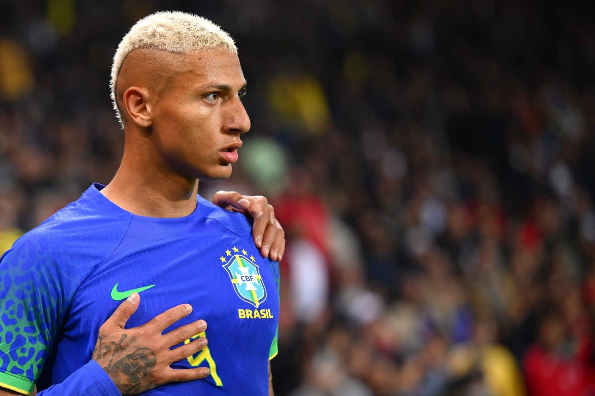 Brazil's forward Richarlison celebrates after scoring his team's second goal during a friendly football match on Tuesday  (AFP via Getty Images)