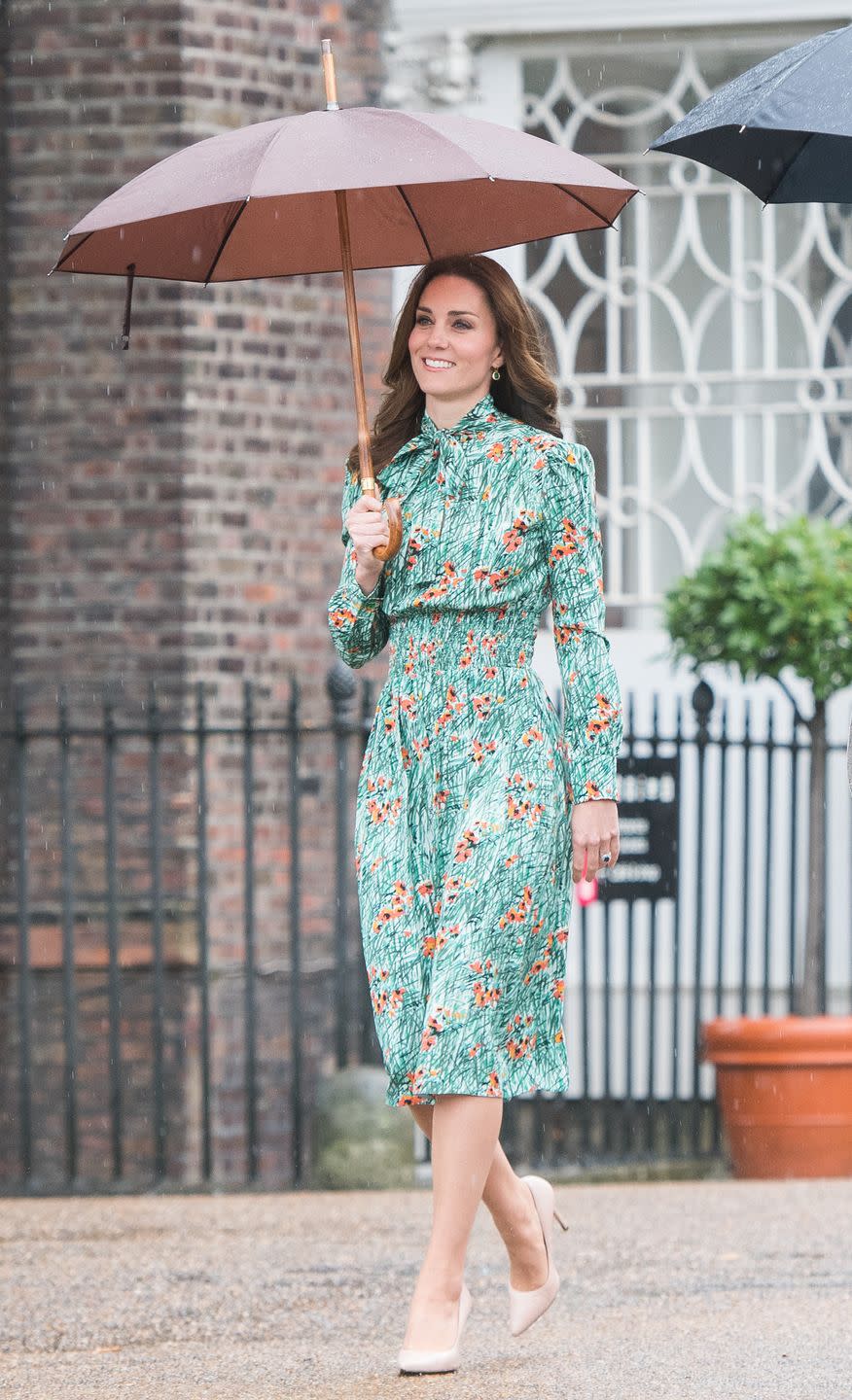 the duke and duchess of cambridge and prince harry visit the white garden in kensington palace