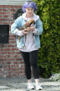 <p>Kelly Osbourne leaves her brother Jack's house in Los Angeles on Saturday with her dog.</p>