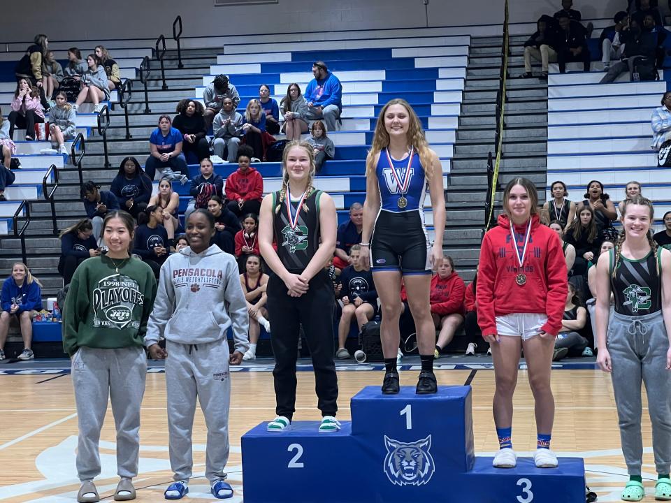 Booker T. Washington High's Taylor Audiffred repeated as district champion in Friday's District 1-2A weightlifting tournament.