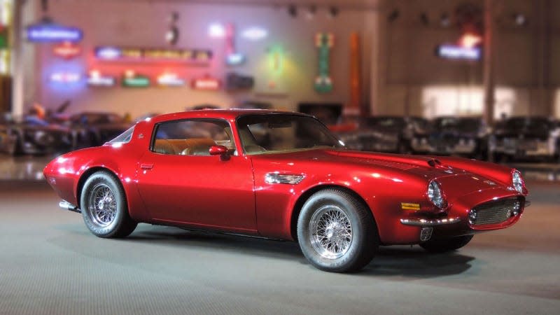 A photo of a red Pontiac Pegasus sports car concept. 