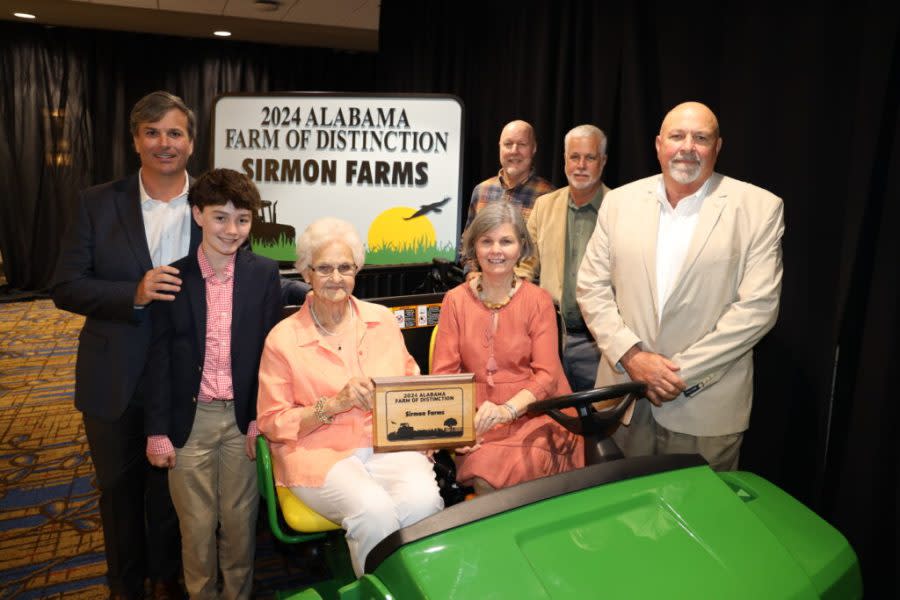 The 2024 Farm of Distinction is Sirmon Farms of Baldwin County. Pictured from left are Joseph Fureigh of First South Farm Credit; Tiffany Lester of Alabama Farmers Cooperative; Patti and Joel Sirmon; Shannon Norwood of TriGreen; Neal Stanford of SunSouth; and Alfa Insurance and Alabama Farmers Federation President and CEO Jimmy Parnell. (Courtesy: Alabama Farmers Federation)