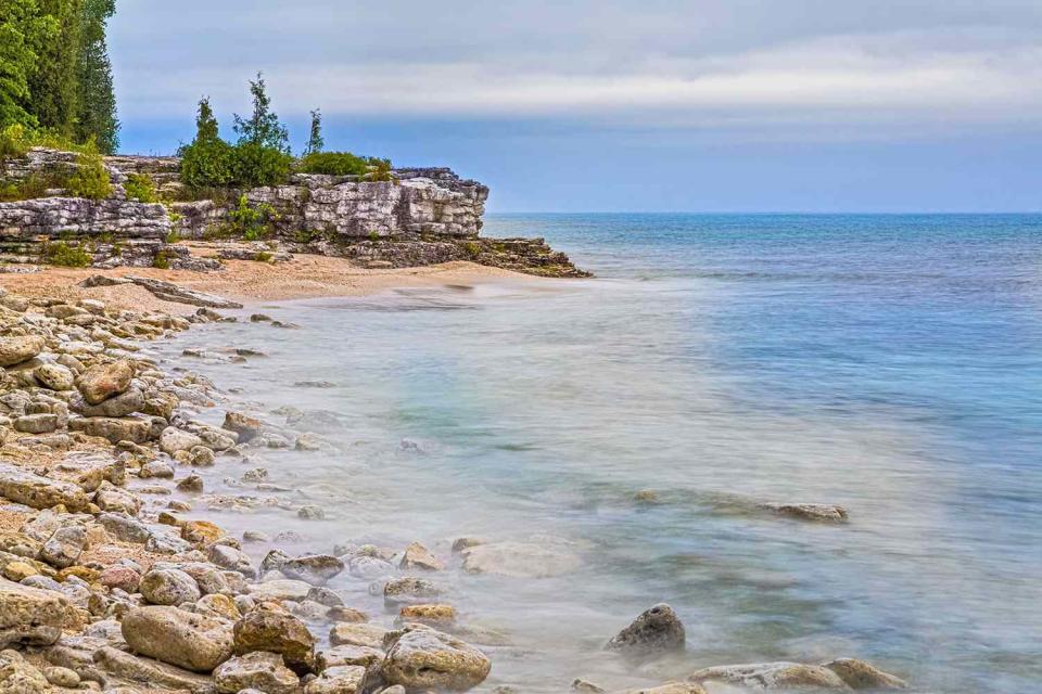 <p>getty</p> Stock image of Cave Point County Park, in Door County, Wisconsin