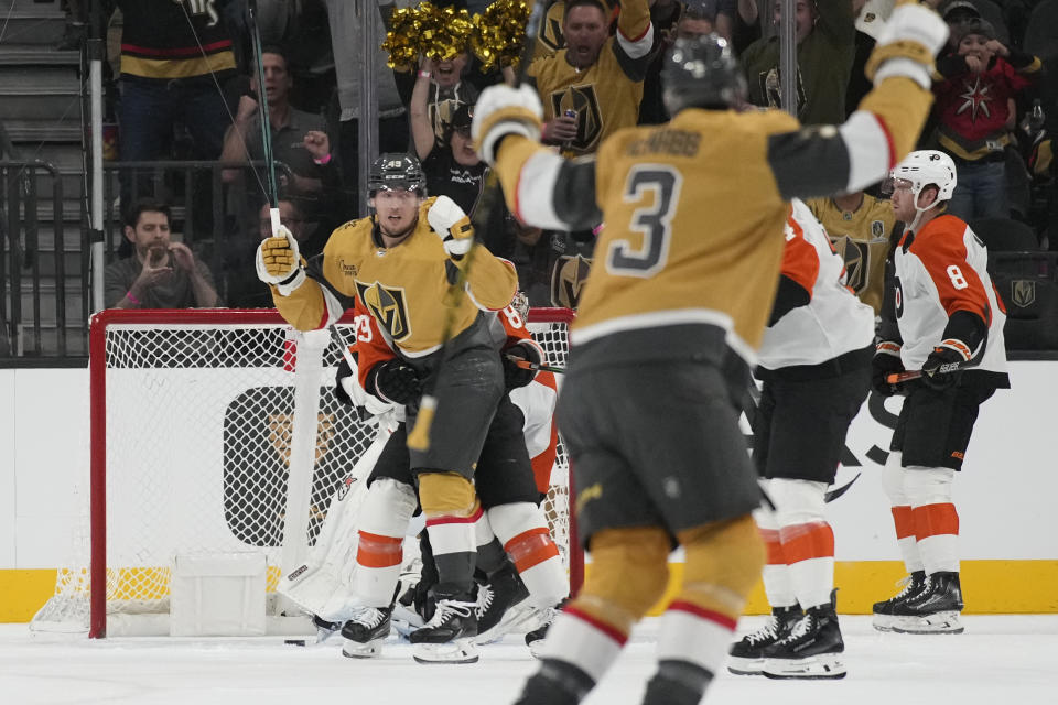 Vegas Golden Knights center Ivan Barbashev (49) celebrates after scoring against the Philadelphia Flyers during the first period of an NHL hockey game Tuesday, Oct. 24, 2023, in Las Vegas. (AP Photo/John Locher)