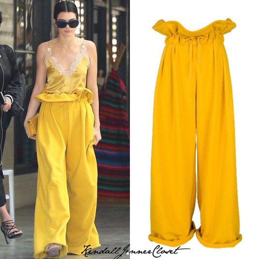 On a recent outing in Los Angeles, Kendall Jenner stepped out wearing a pair of yellow paper-bag waist pants.