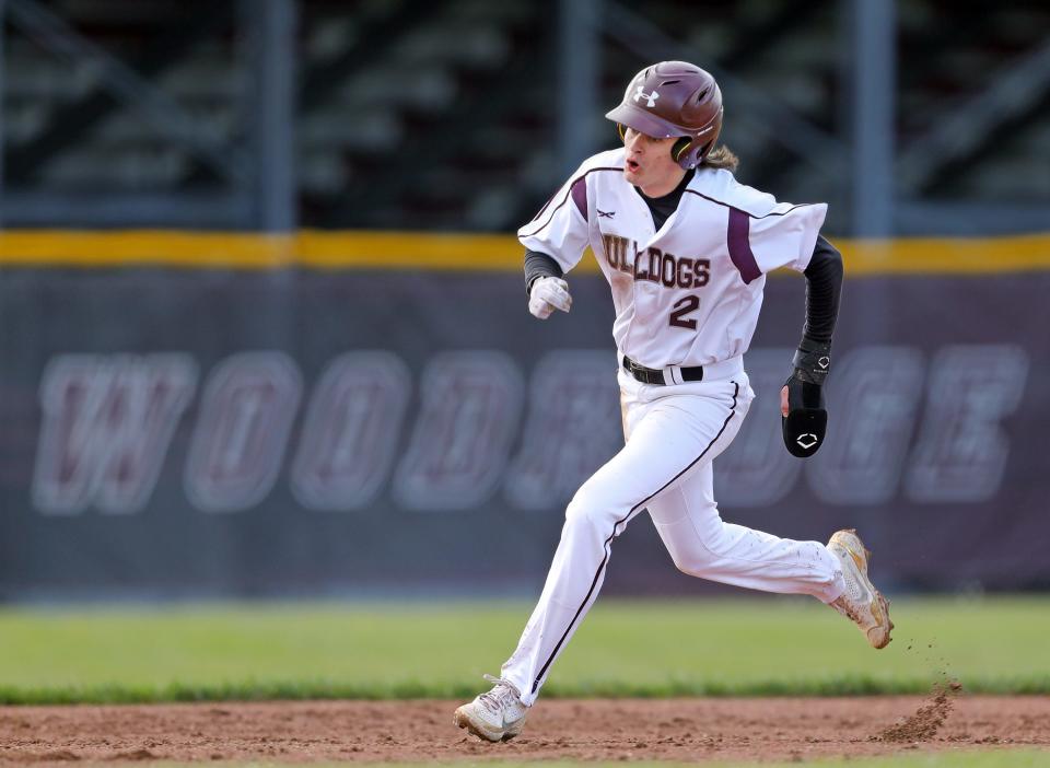 Woodridge's Will Heisler hustles around the bases against St. Vincent-St. Mary on May 4, 2023, in Cuyahoga Falls.