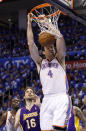 Oklahoma City Thunder center Nick Collison (4) dunks in front of Los Angeles Lakers forward Pau Gasol, of Spain (16) in the second quarter of Game 1 in the second round of the NBA basketball playoffs, in Oklahoma City, Monday, May 14, 2012. (AP Photo/Sue Ogrocki)