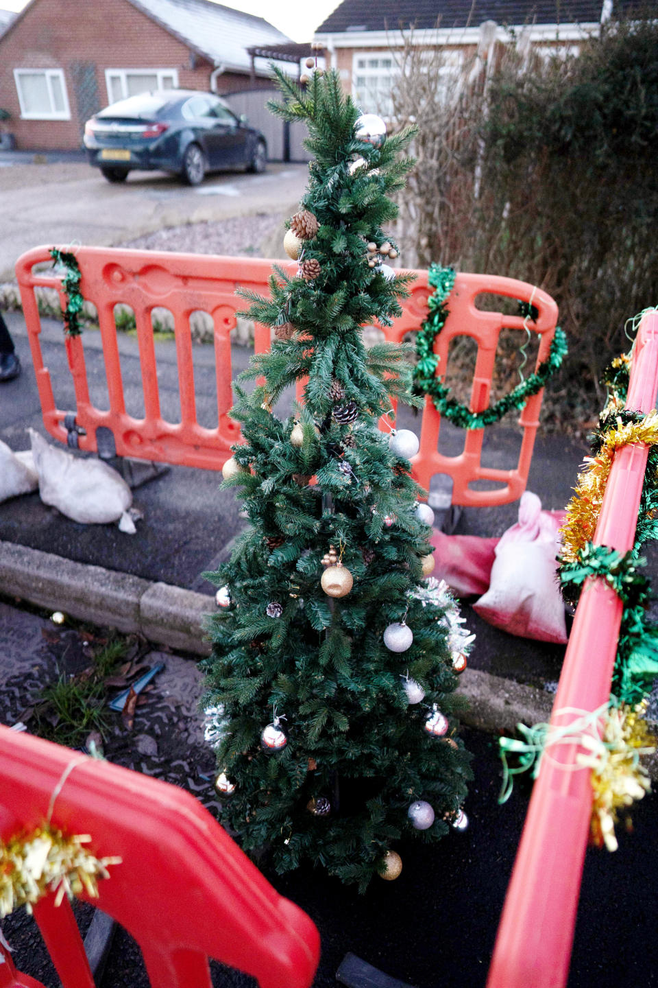 No-one knows which prankster filled the hole with festive decorations. (SWNS)