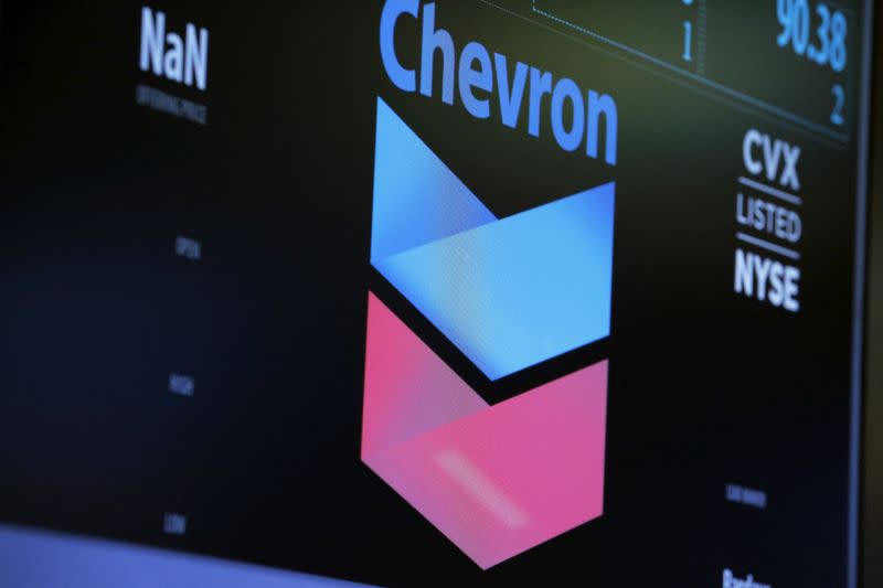 FILE PHOTO: The logo of Chevron is shown on a monitor above the floor of the New York Stock Exchange in New York