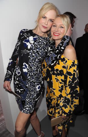 <p>Matt Baron/Shutterstock</p> Nicole Kidman and Naomi Watts at the Michael Kors fashion show in 2018.