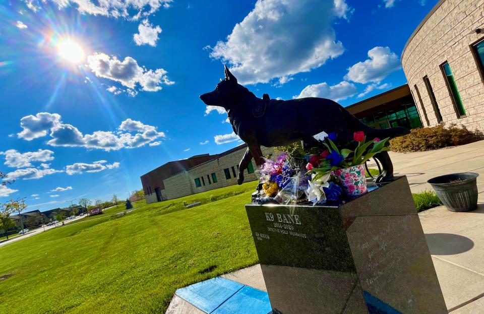 K9 Bane's official end of watch was Thursday, May 9, 2024. Soon after the announcement of his passing on May 10, people started leaving things at his bronze statue in front of the St. Francis Civic Center, 3400 E. Howard Ave.