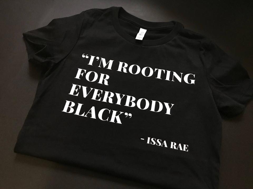 Get the <a href="https://knowdefinition.com/product/im-rooting-for-everybody-black-t-shirt/" target="_blank" rel="noopener noreferrer">"I'm Rooting For Everybody Black" T-shirt from Know Definition for $30﻿</a>