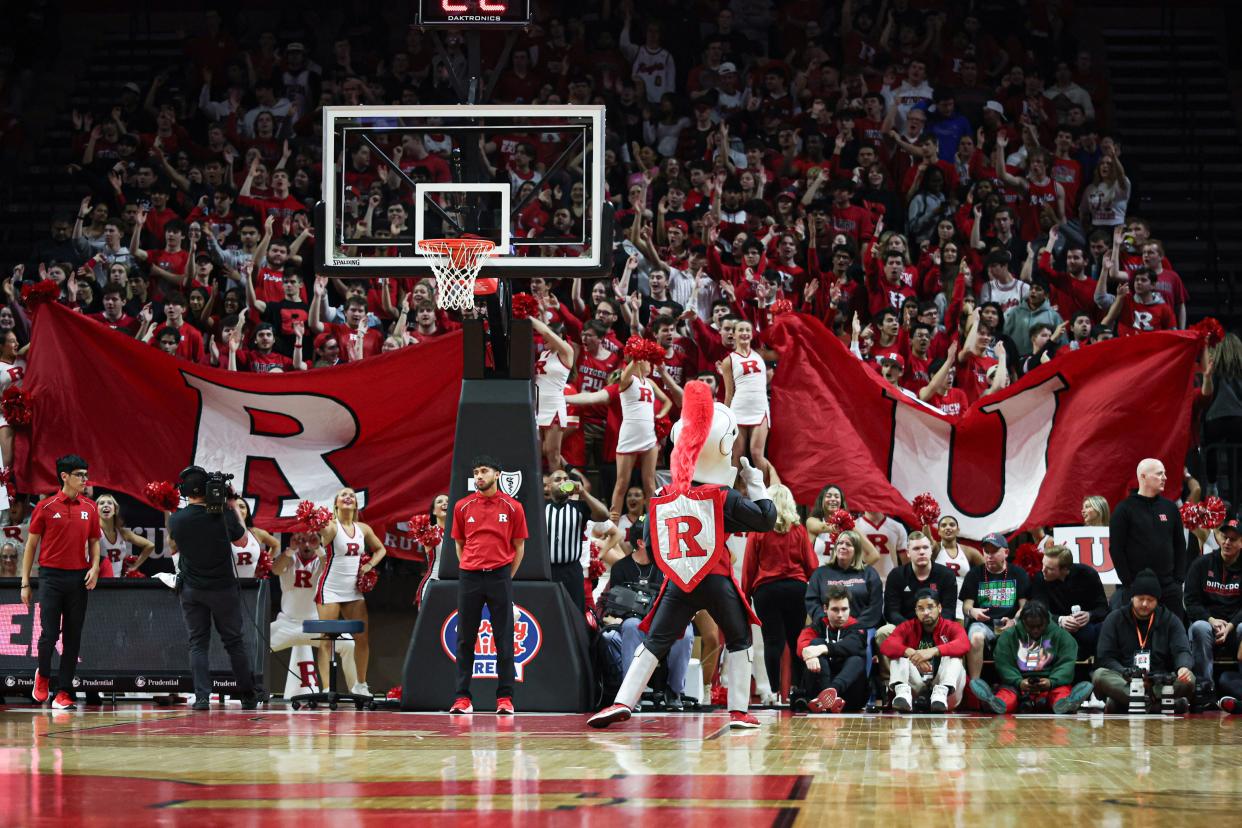 Feb 10, 2024; Piscataway, New Jersey, USA; Rutgers Scarlet Knights fans cheer during the first half of a game between the Scarlet Knights and the Wisconsin Badgers at Jersey Mike's Arena.