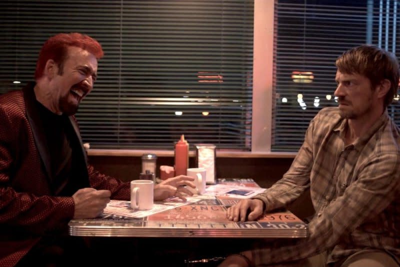 Nicolas Cage (L) and Joel Kinnaman star in "Sympathy for the Devil." Photo courtesy of RLJE Films