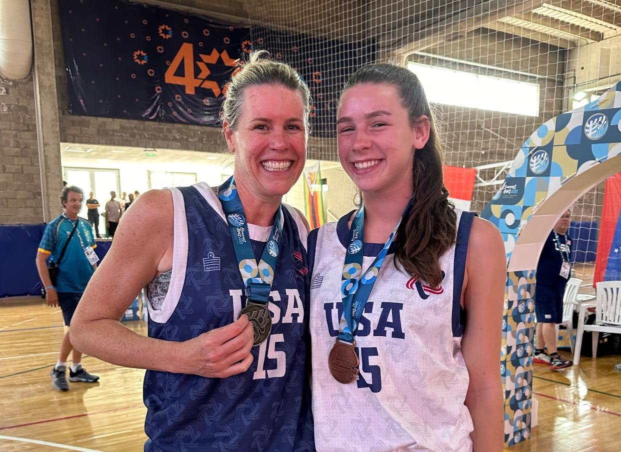 Carolyn Dorfman of Mamaroneck and her daughter Addison, 15, after receiving basketball medals at the Maccabi Pan-Am Games in Argentina in December. Carolyn played on the USA open team, and Addison played on the USA U18 team. When countries pulled out over security concerns, Addison's team was forced to play against adult teams, including playing against her mother.