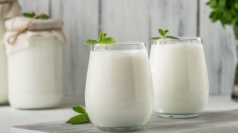 thick milk in a glasses 