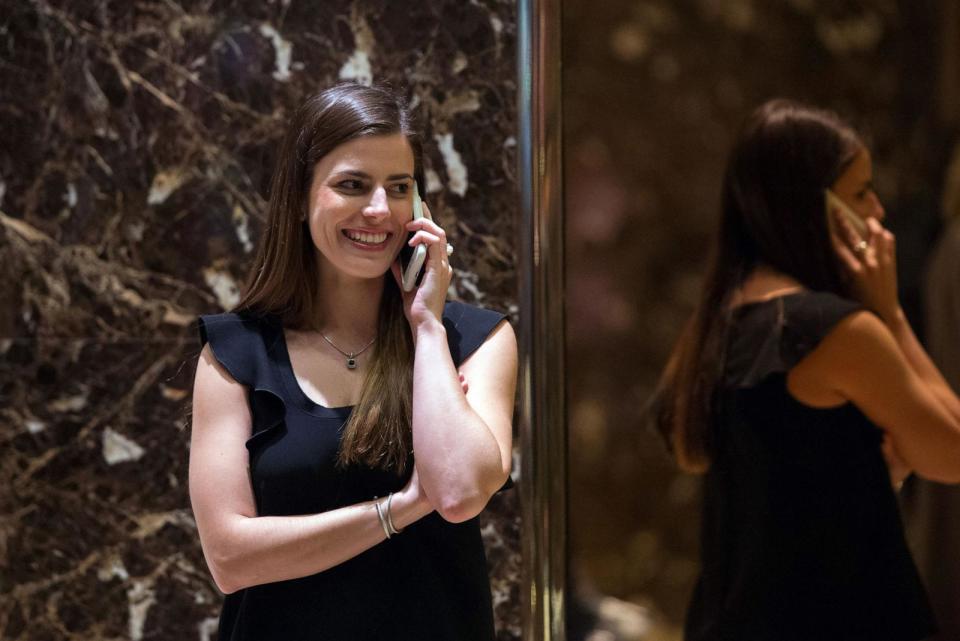 PHOTO: In this Nov. 30, 2016, file photo, President-elect Donald Trump's transition liaison Madeline Westerhout talks on the phone in the lobby of Trump Tower, in New York. (Bryan R. Smith/AFP via Getty Images, FILE)