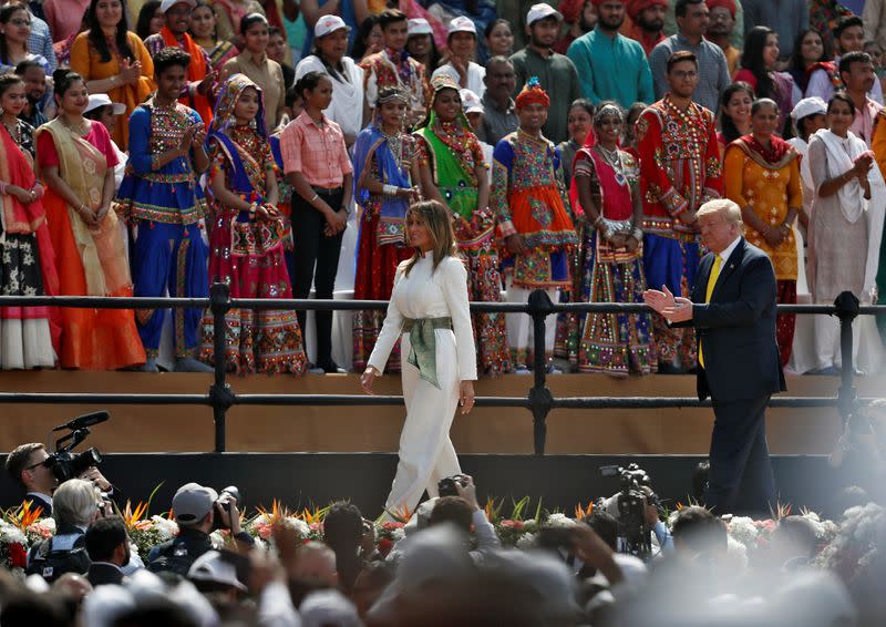 U.S. President Donald Trump and first lady Melania Trump leave after attending the "Namaste Trump" event at Sardar Patel Gujarat Stadium, in Ahmedabad