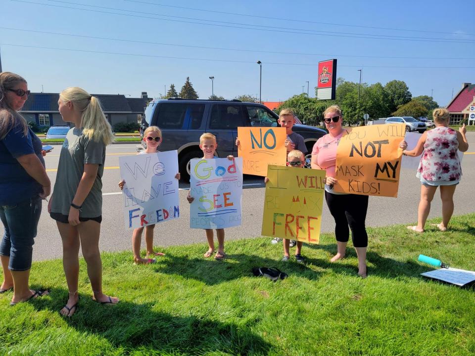 Protesters gathered outside the Ottawa County Department of Public Health in 2020 to oppose a mask mandate in schools. Hours later, OCDPH issued a pre-K-6 mask requirement.