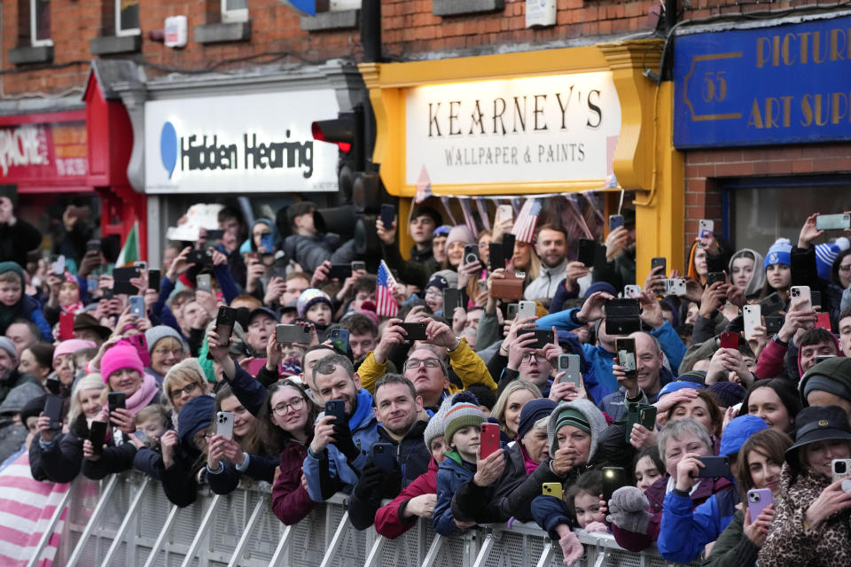 People line the streets as President Joe Biden tours Dundalk, Ireland, Wednesday, April 12, 2023. (AP Photo/Patrick Semansky)