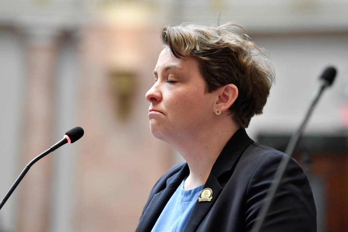 Kentucky House Representative Josie Raymond composes herself as she speaks against Senate Bill 150 at the Kentucky House of Representatives in Frankfort, Ky., Thursday, March 16, 2023. (AP Photo/Timothy D. Easley)