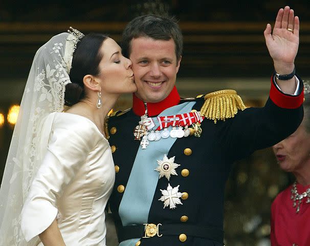 ODD ANDERSEN/AFP via Getty The future King Frederik and Queen Mary on their May 2004 wedding day.