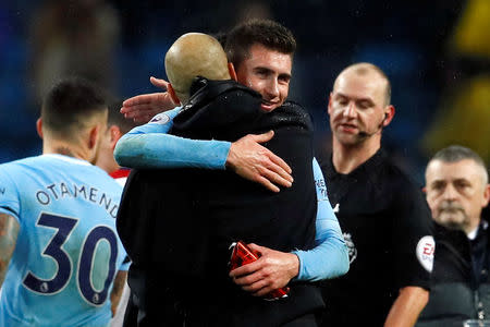 Soccer Football - Premier League - Manchester City vs West Bromwich Albion - Etihad Stadium, Manchester, Britain - January 31, 2018 Manchester City manager Pep Guardiola celebrates with Aymeric Laporte after the match Action Images via Reuters/Jason Cairnduff