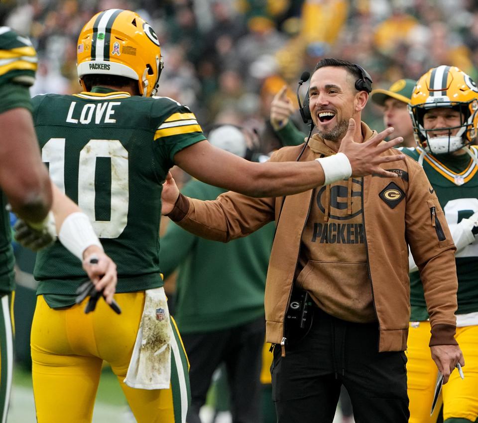 Green Bay Packers quarterback Jordan Love (10) is hugged by head coach Matt LaFleur after throwing a touchdown pass during the fourth quarter of their game at Lambeau Field Sunday, November 5, 2023 in Green Bay, Wisconsin. The Green By a Packers beat the Los Angeles Rams 20-3.



Mark Hoffman/Milwaukee Journal Sentinel