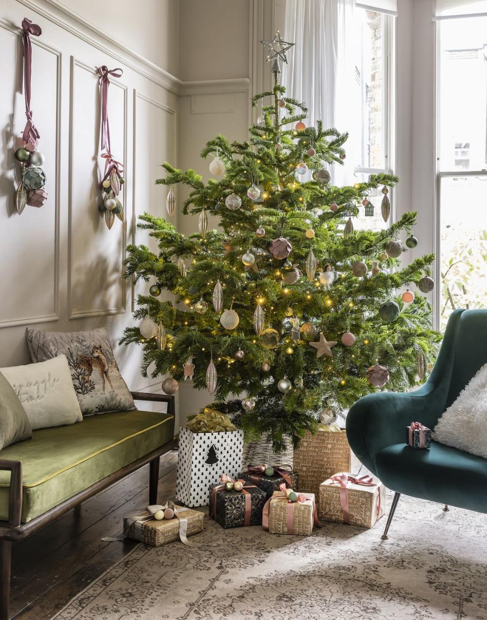 <p>'Those who love a luxe look for their tree will find plenty of inspiration within the Frosty and Luxury trends,' say Tesco. 'With <a href="https://www.housebeautiful.com/uk/decorate/display/g177/best-christmas-tree-baubles/" rel="nofollow noopener" target="_blank" data-ylk="slk:tree decorations;elm:context_link;itc:0;sec:content-canvas" class="link ">tree decorations</a> adorned in feathers and glitter, or choose rich textures like velvet in navy, deep pinks and gold.'</p><p><a class="link " href="https://www.tesco.com/groceries/en-GB/search?query=homeware" rel="nofollow noopener" target="_blank" data-ylk="slk:SHOP HOMEWARE AT TESCO;elm:context_link;itc:0;sec:content-canvas">SHOP HOMEWARE AT TESCO</a></p>