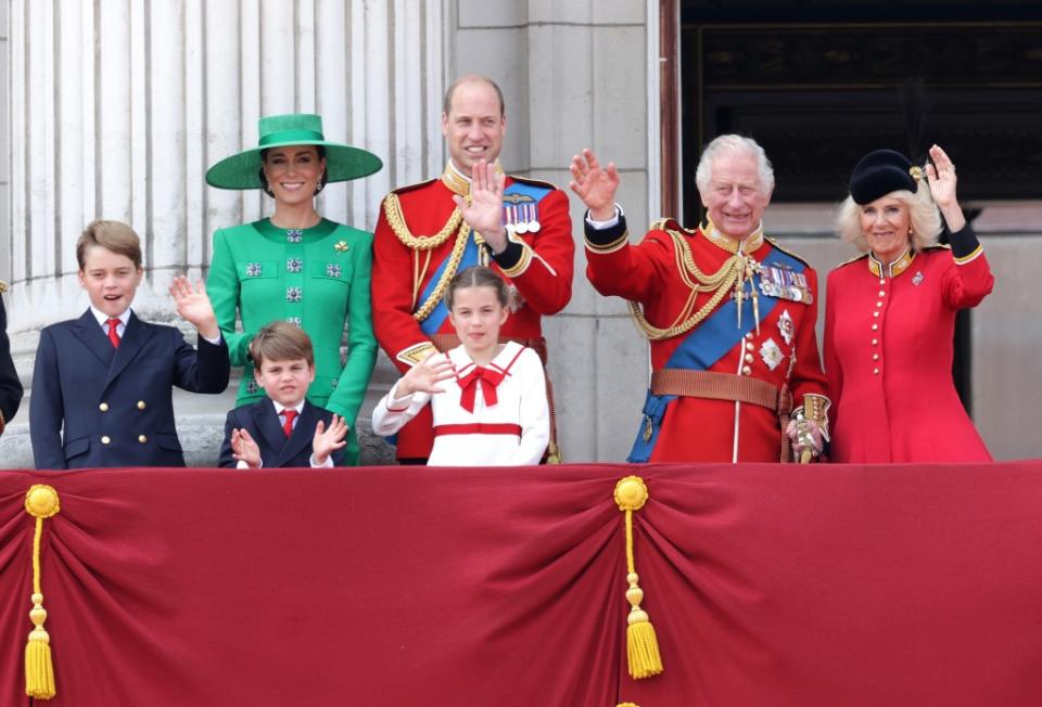 King Charles III and Queen Camilla wave alongside Prince William of Wales, Prince Louis of Wales, Catherine, Princess of Wales and Prince George of Wales on the Buckingham Palace balcony during Trooping the Colour on June 17, 2023, in London. Getty Images