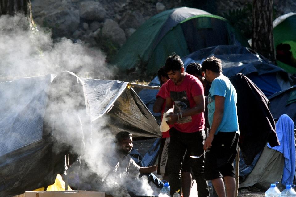 Migrants gathered in makeshift camps in northern Bosnia