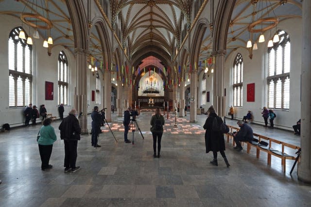 People observe a minute’s silence at Blackburn Cathedral