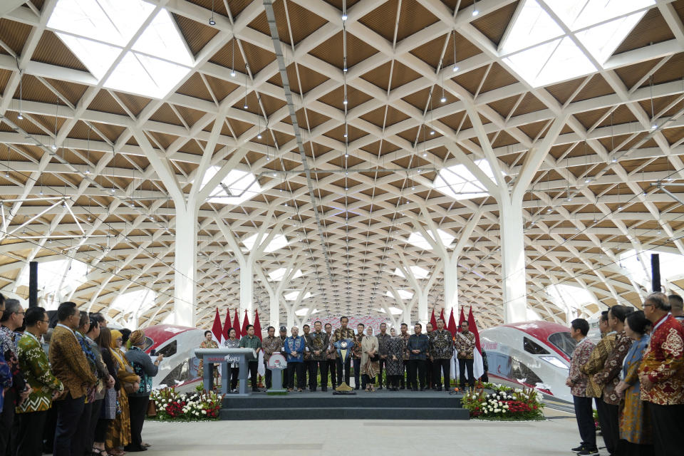 Indonesian President Joko widodo , center, delivers his speech during the opening ceremony for launching Southeast Asia's first high-speed railway at Halim station in Jakarta, Indonesia, Monday, Oct. 2, 2023. Indonesian President Joko Widodo launched Southeast Asia's first high-speed railway that will start its commercial operations on Monday, a key project under China's Belt and Road infrastructure initiative that will cut travel time between two cities from the current three hours to about 40 minutes. (AP Photo/Achmad Ibrahim)